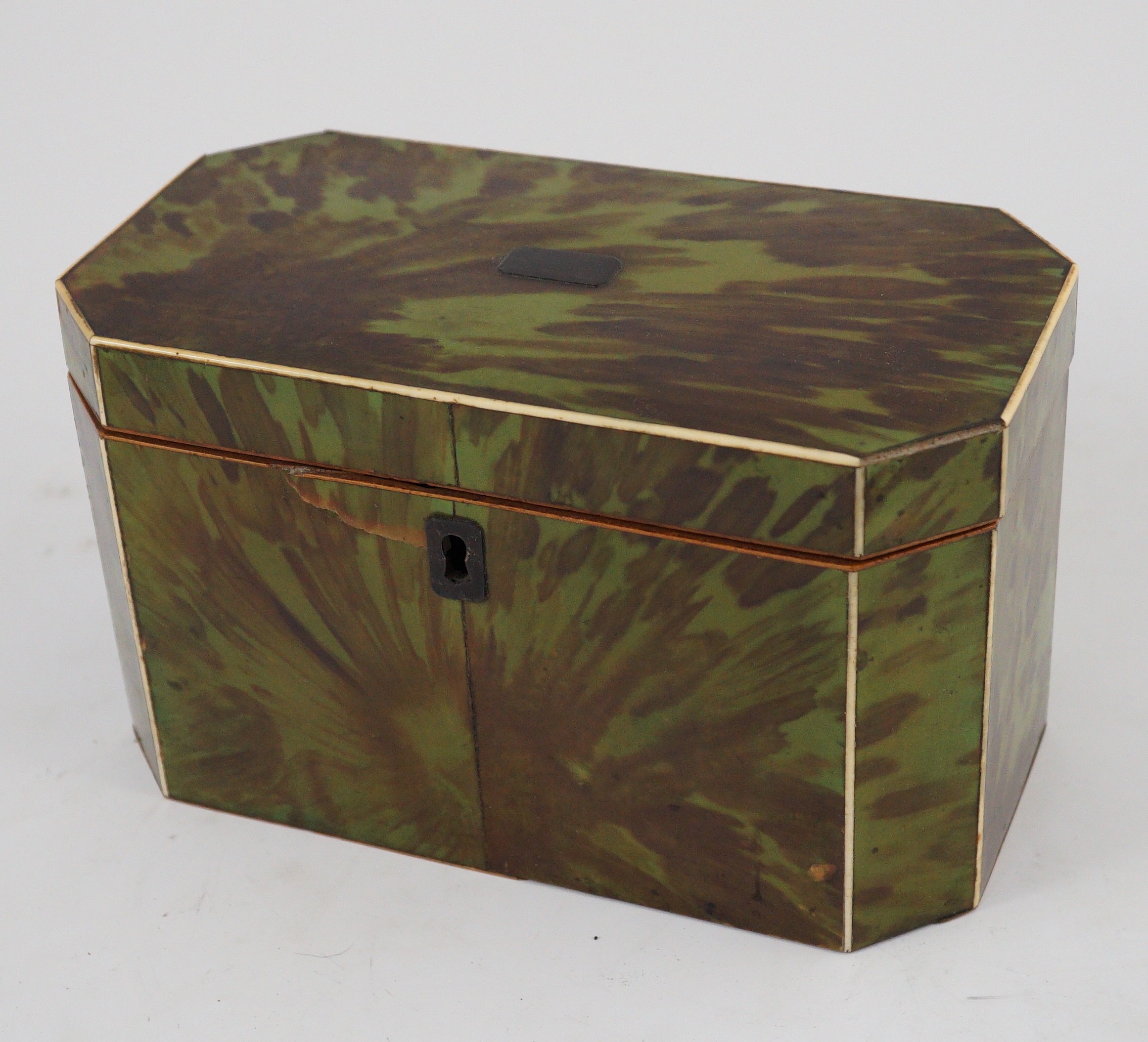 A George III green stained tortoiseshell and ivory octagonal tea caddy, 18.5cm wide 9.5cm deep 11cm high